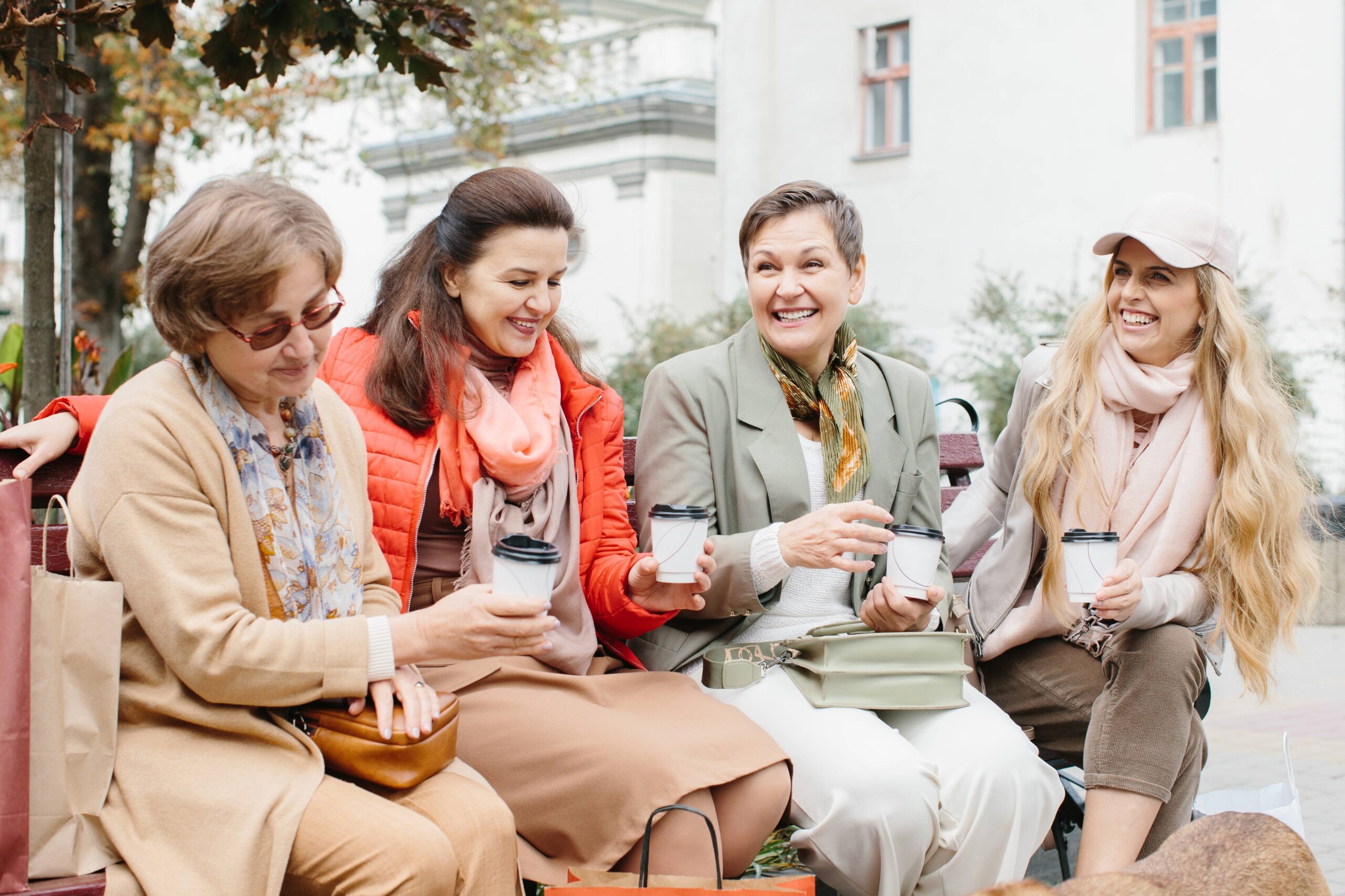 senior-women-friends-with-coffee-sitting-outdoors-2026-01-08-05-50-43-utc (1)